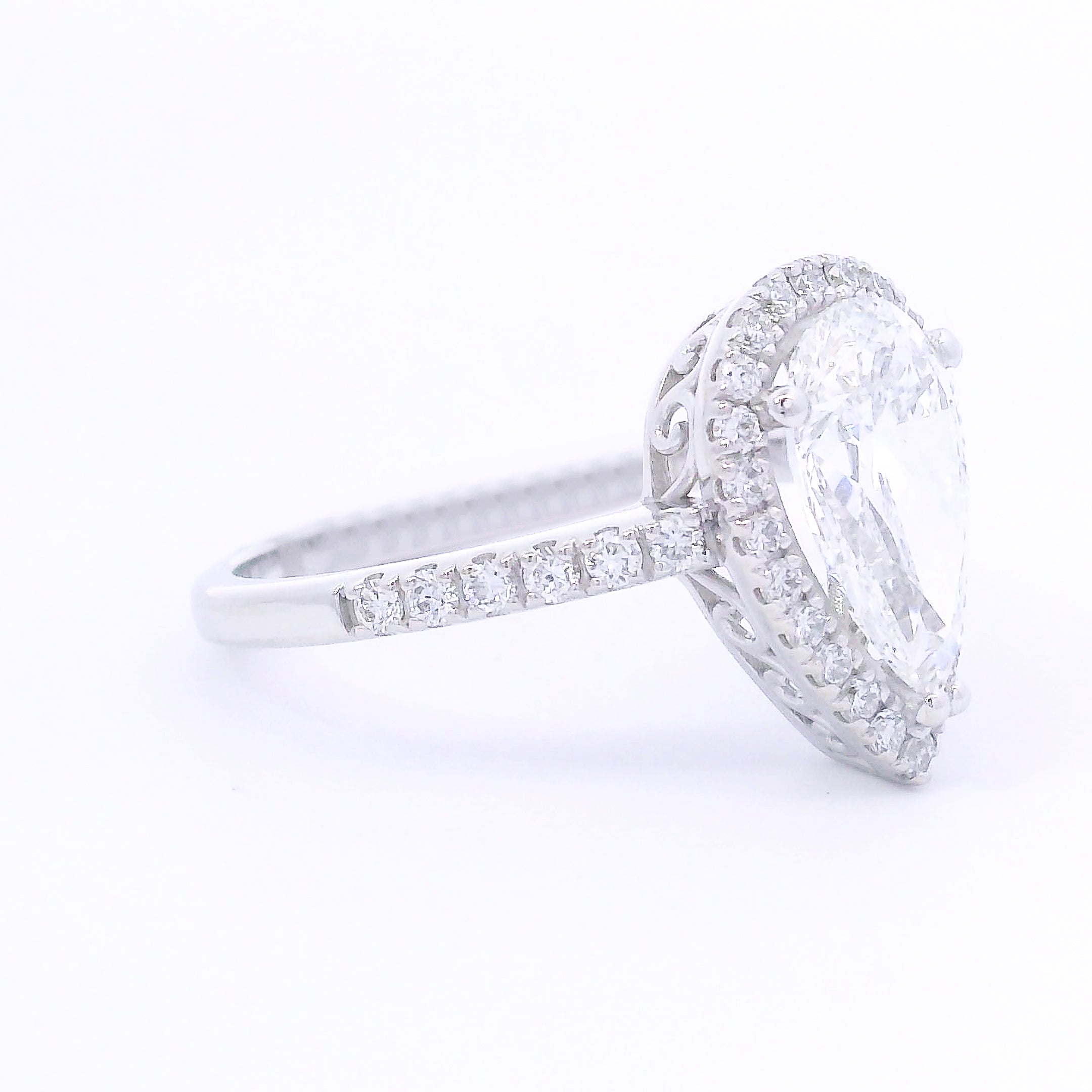 9k White Gold Pear Shaped Halo Lab-Grown Diamond Solitaire with Diamond Band